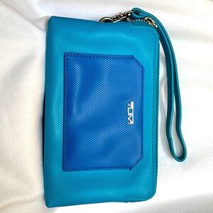 Tumi two-tone leather wristlet (gently used)